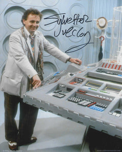 Sylvester McCoy signed in Black doctor who