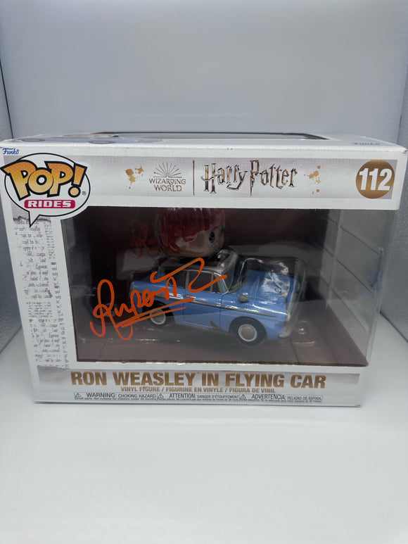 Rupert Grint signed Funko signed in Orange paint pen. Harry Potter LAST ONE
